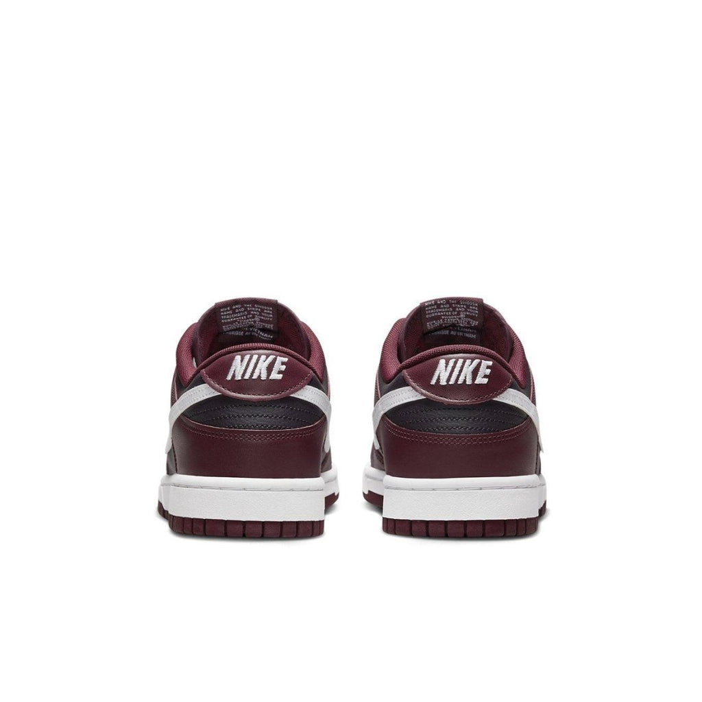 Nike Dunk Low Dark Beetroot sneakers rear view showcasing burgundy and white design details.