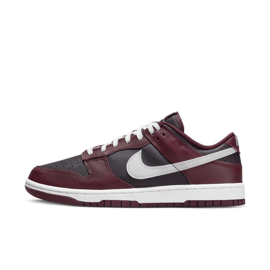 Nike Dunk Low Dark Beetroot sneaker featuring bold bordeaux overlays and grey detailing.