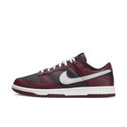 Nike Dunk Low Dark Beetroot sneaker featuring bold bordeaux overlays and grey detailing.