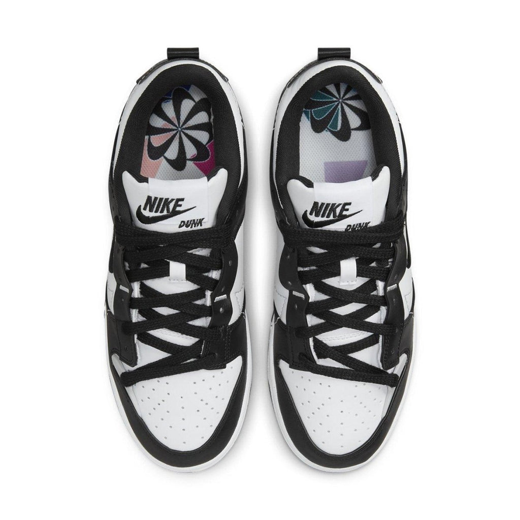 Nike Dunk Low Disrupt 2 Panda women's sneakers, featuring black and white design with a perforated toe and contrasting Swoosh.