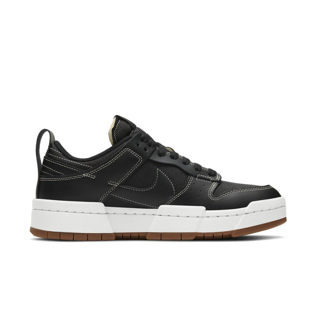 Nike Dunk Low Disrupt Black Gum women's sneaker featuring a platform sole and modern design.