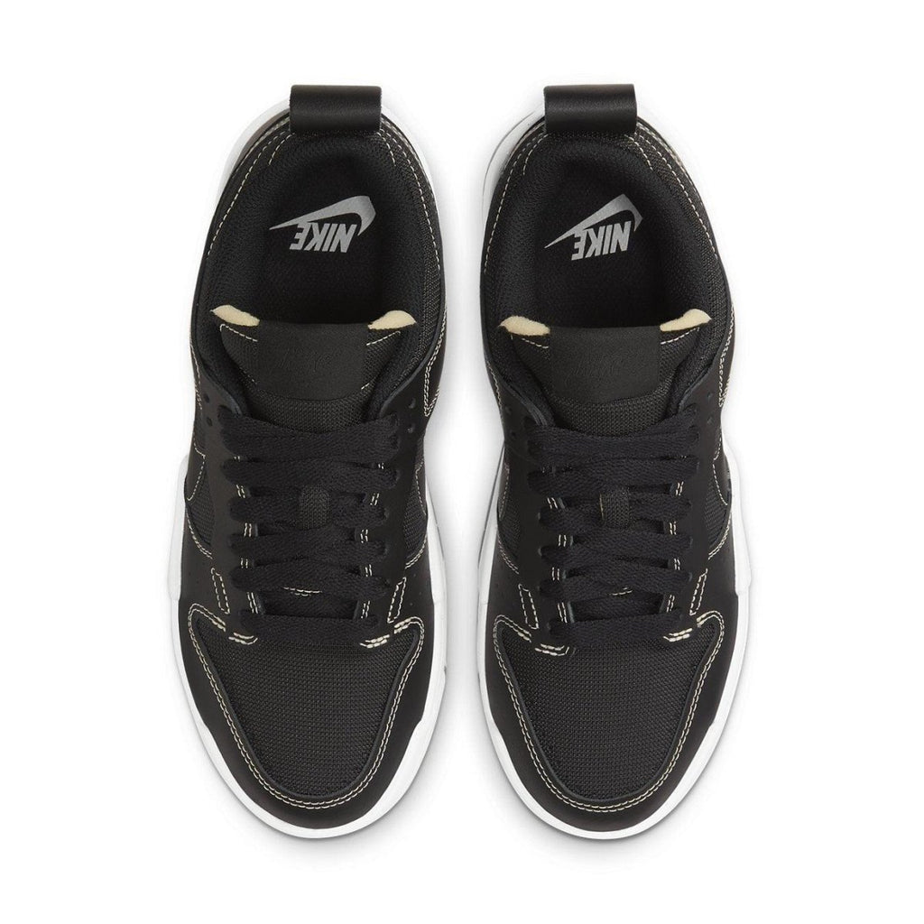 Nike Dunk Low Disrupt Black Gum (W) top view with black upper and white sole design.