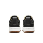 Back view of Nike Dunk Low Disrupt Black Gum (W) showcasing sleek design and platform sole.