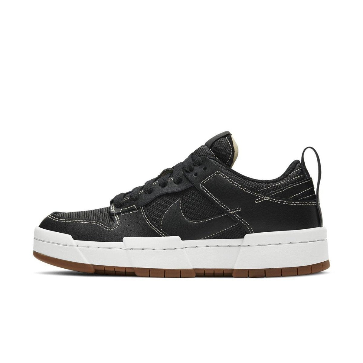 Nike Dunk Low Disrupt Black Gum for women, featuring a modern silhouette and exaggerated platform design.