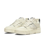 Nike Dunk Low Disrupt Coconut Milk sneakers for women with leather and padded mesh design, offering style and comfort.