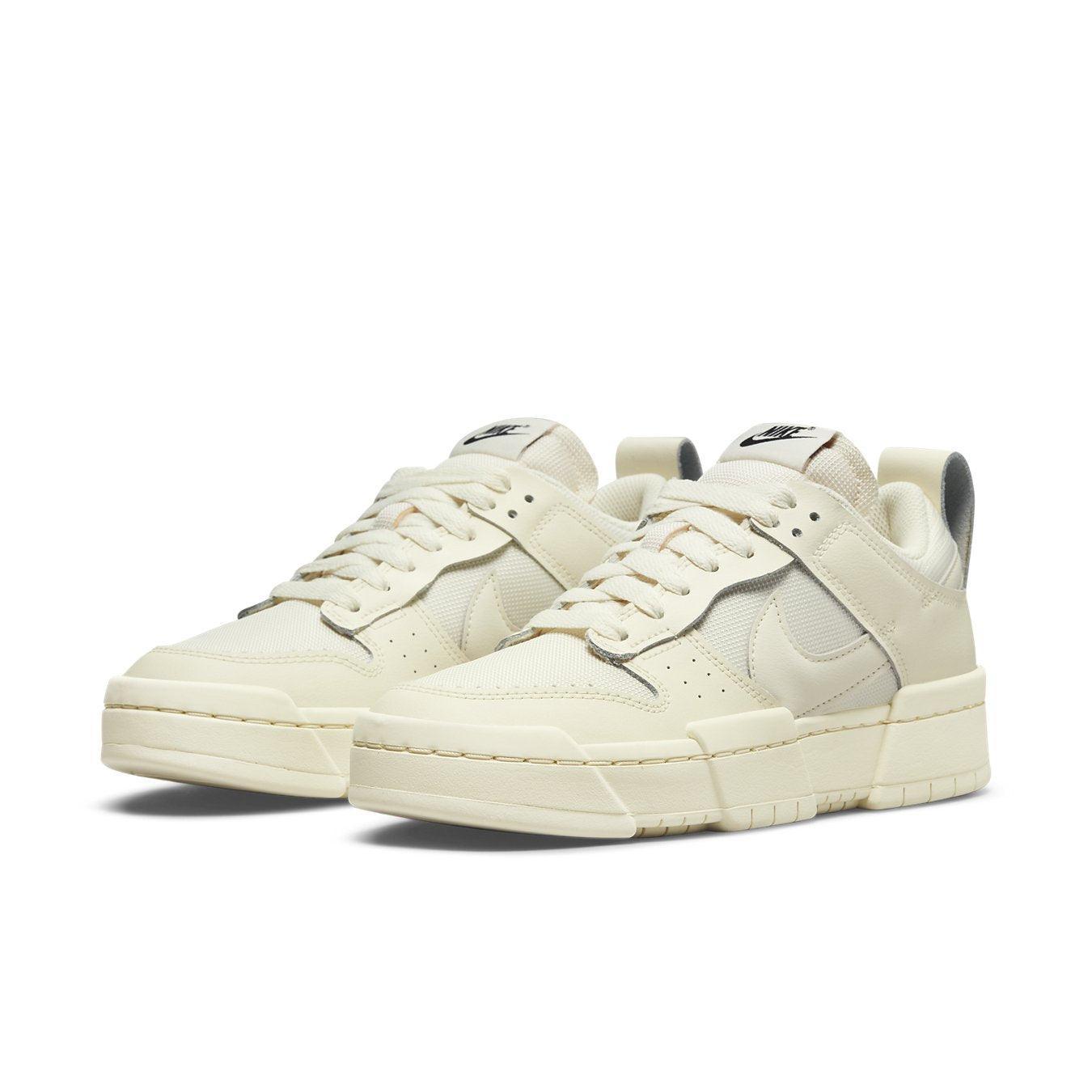 Nike Dunk Low Disrupt Coconut Milk sneakers for women with leather and padded mesh design, offering style and comfort.