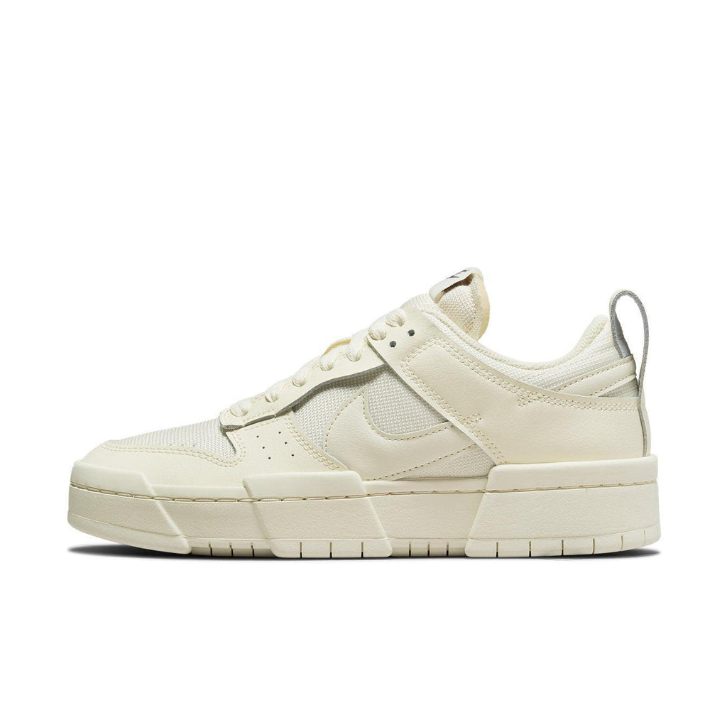 Nike Dunk Low Disrupt Coconut Milk women's sneaker with cream leather and padded mesh panels.