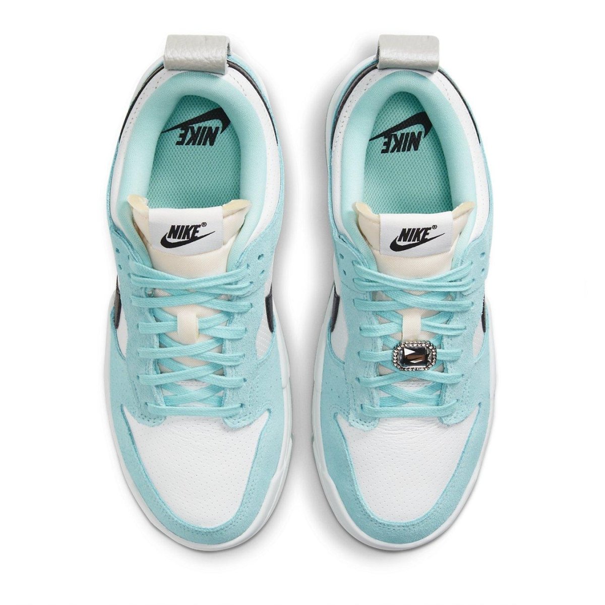 Nike Dunk Low Disrupt Copa sneakers in white, light blue, and black with silver detailing, top view.