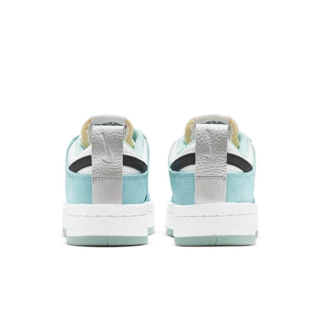 Nike Dunk Low Disrupt Copa (W) sneakers, featuring a turquoise upper, white sole, and silver accents for a stylish look.