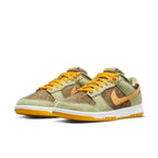 Nike Dunk Low Dusty Olive sneakers in olive green with brown and Pro Gold accents, featuring a white sole.