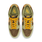Nike Dunk Low Dusty Olive sneaker featuring suede upper in Dusty Olive, brown, and Pro Gold with yellow laces.