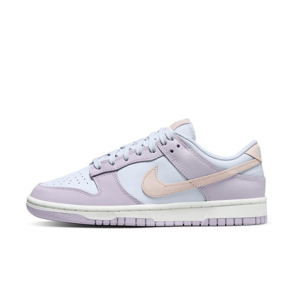 Nike Dunk Low Easter 2022 women's sneaker in pastel blue and lavender with pink Swoosh detail.