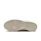 Nike Dunk Low ESS Sail Oxygen Purple women's sneaker sole view showcasing traction and design details.