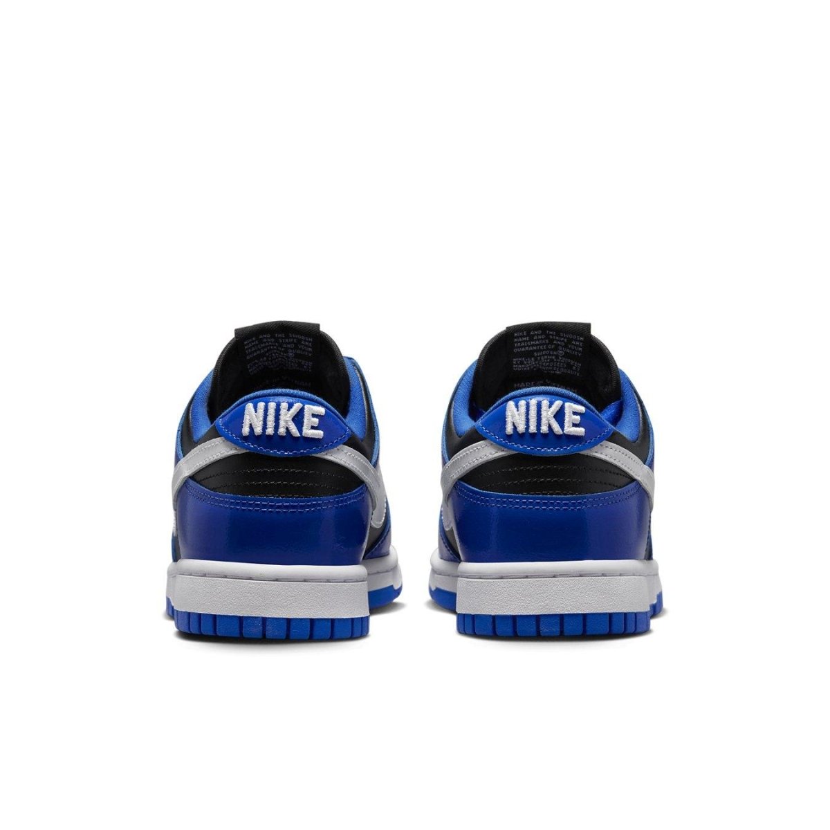 Nike Dunk Low Essential Game Royal Black White (W) shoes, featuring blue and black panels with contrasting white Swoosh.