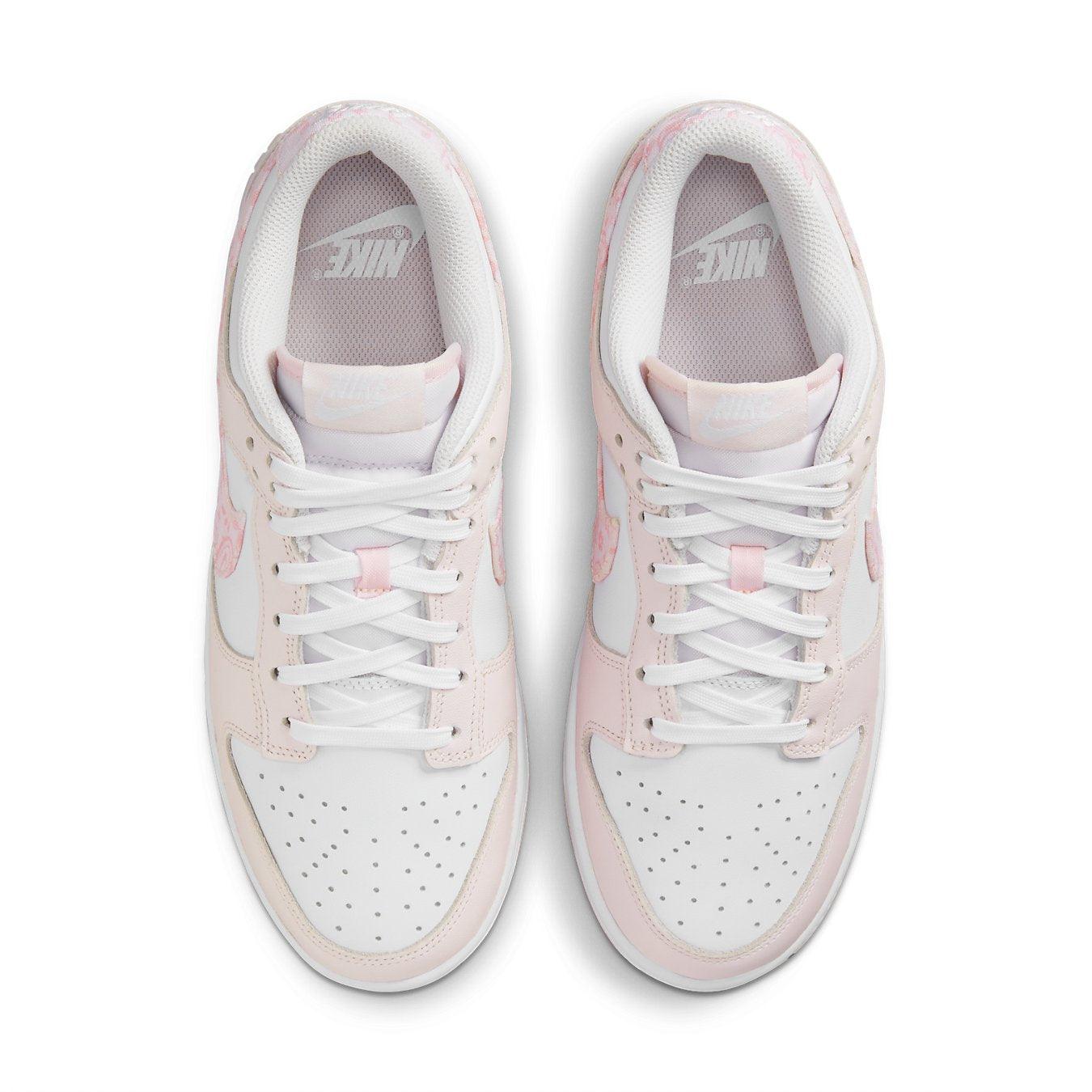 Nike Dunk Low Essential Paisley Pack Pink women’s sneakers with white and pink leather design.