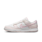 Nike Dunk Low Essential Paisley Pack Pink women’s sneaker in white and pink leather with Paisley details.