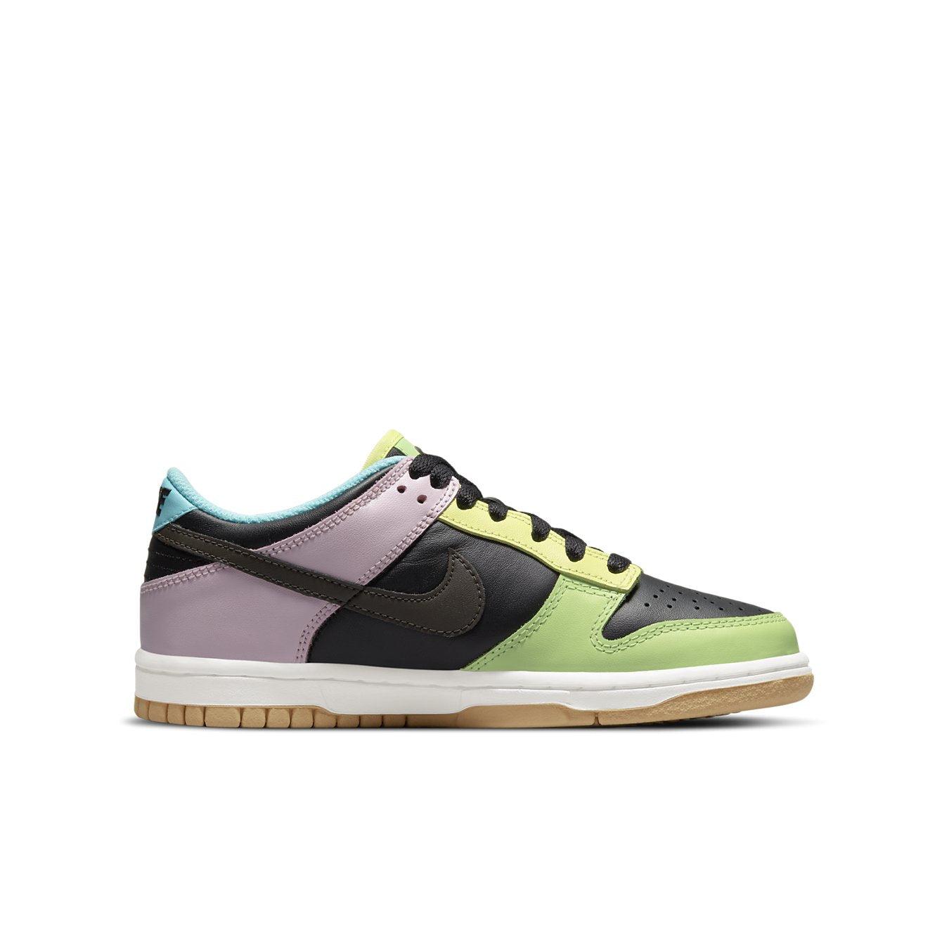Nike Dunk Low SE with black leather upper and colorful overlays, perfect for street style and basketball.