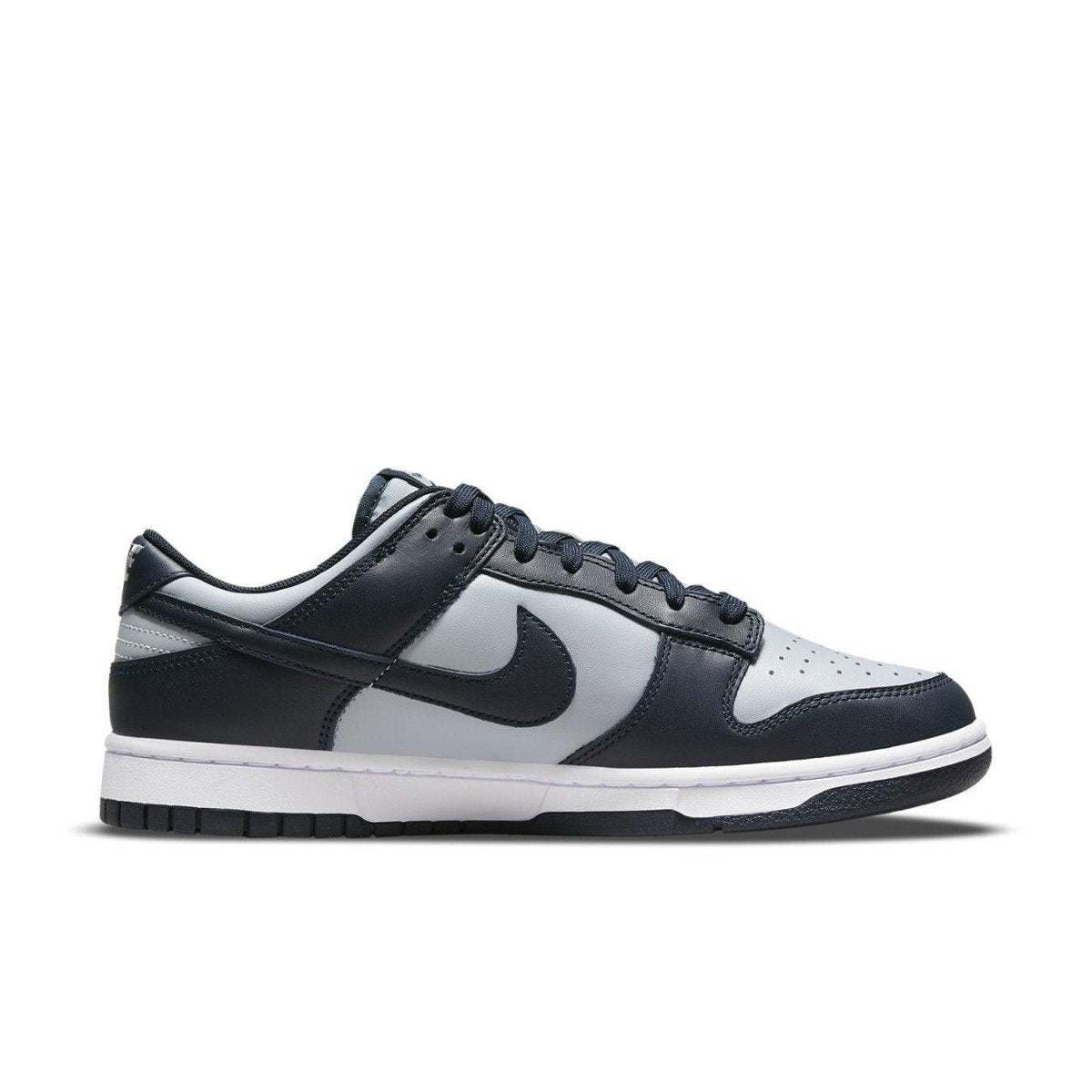 Nike Dunk Low Georgetown sneakers in gray and navy blue colorway with classic design and leather upper.