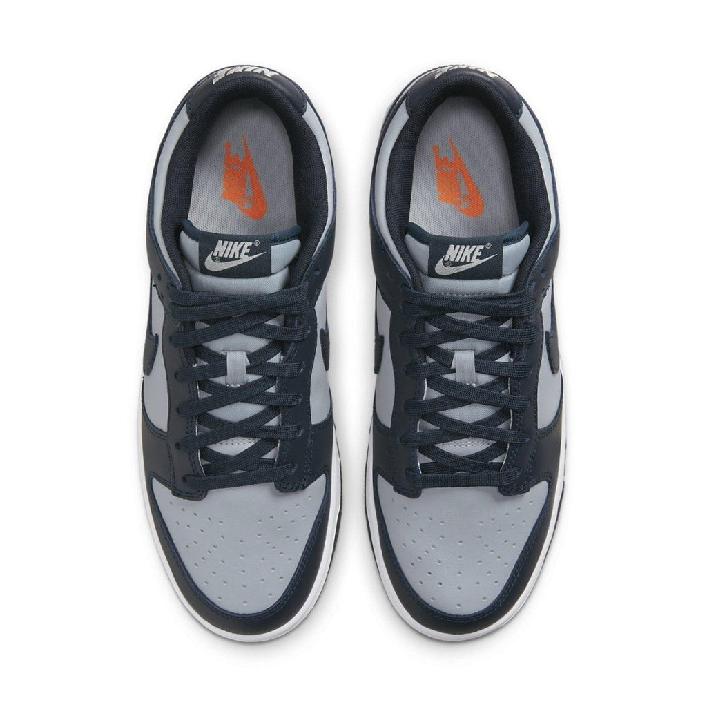 Nike Dunk Low Georgetown sneakers in gray and navy with vibrant orange details and classic design.