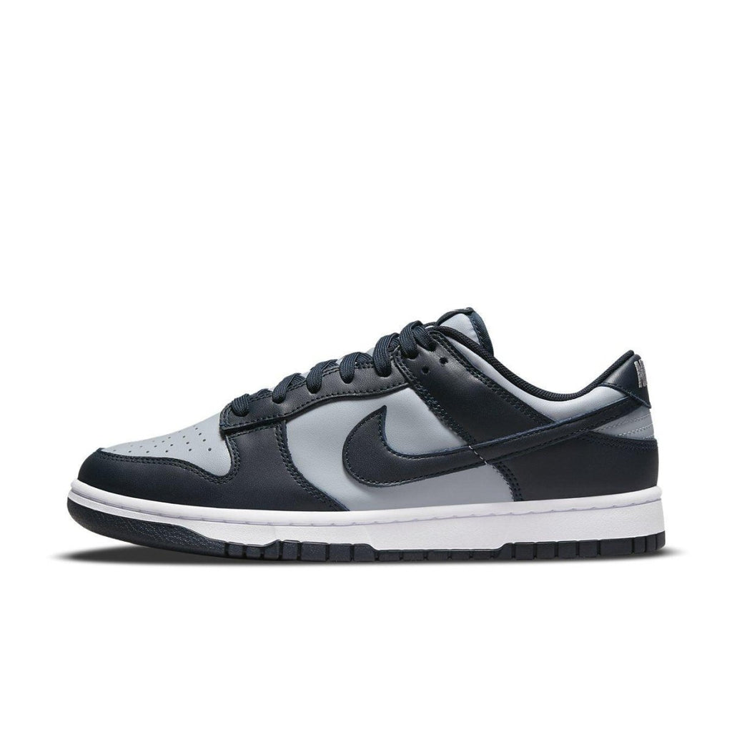 Nike Dunk Low Georgetown in gray and dark blue colorway, featuring leather upper and classic basketball shoe design.