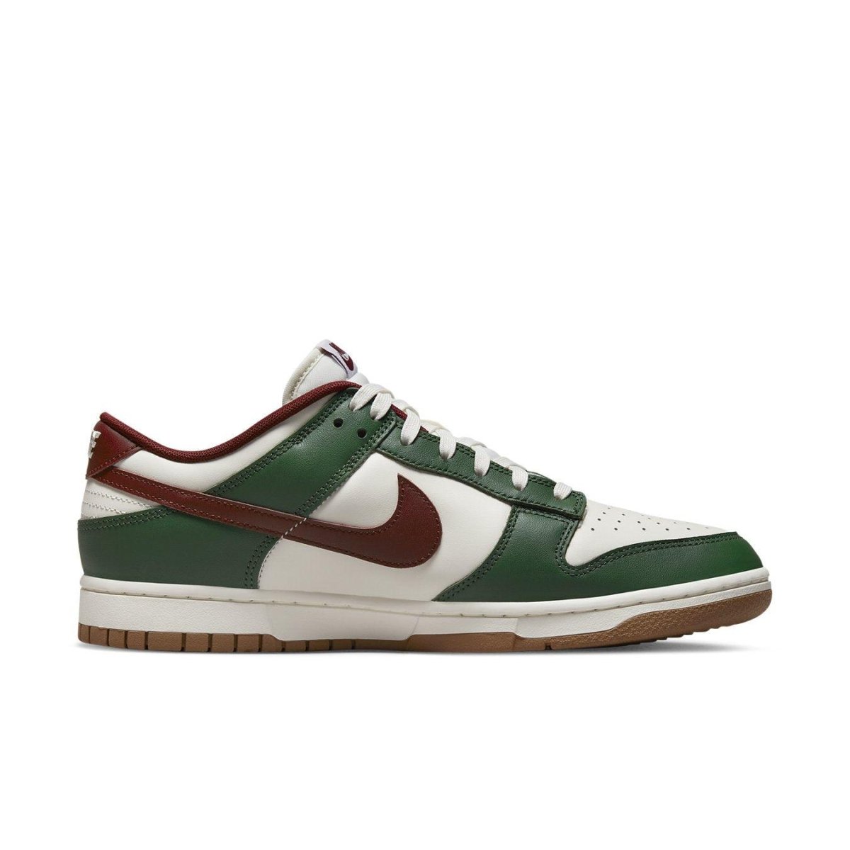 Nike Dunk Low Gorge Green sneaker featuring green and white leather design with Team Red accents and gum outsole.