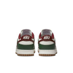 Nike Dunk Low Gorge Green sneakers rear view with green and red accents, showcasing vintage basketball style.