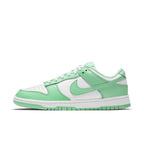 Nike Dunk Low Green Glow (W) sneaker in white and green, featuring leather upper and vibrant green accents.