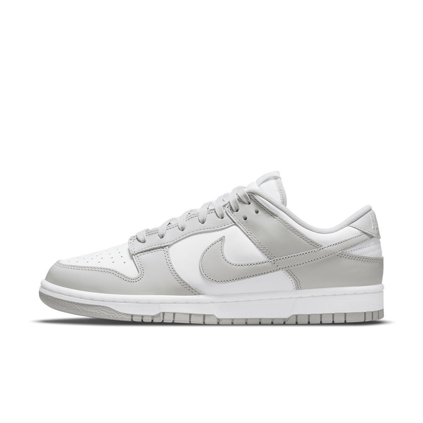 Nike Dunk Low Grey Fog side view featuring grey and white leather design with iconic Swoosh.