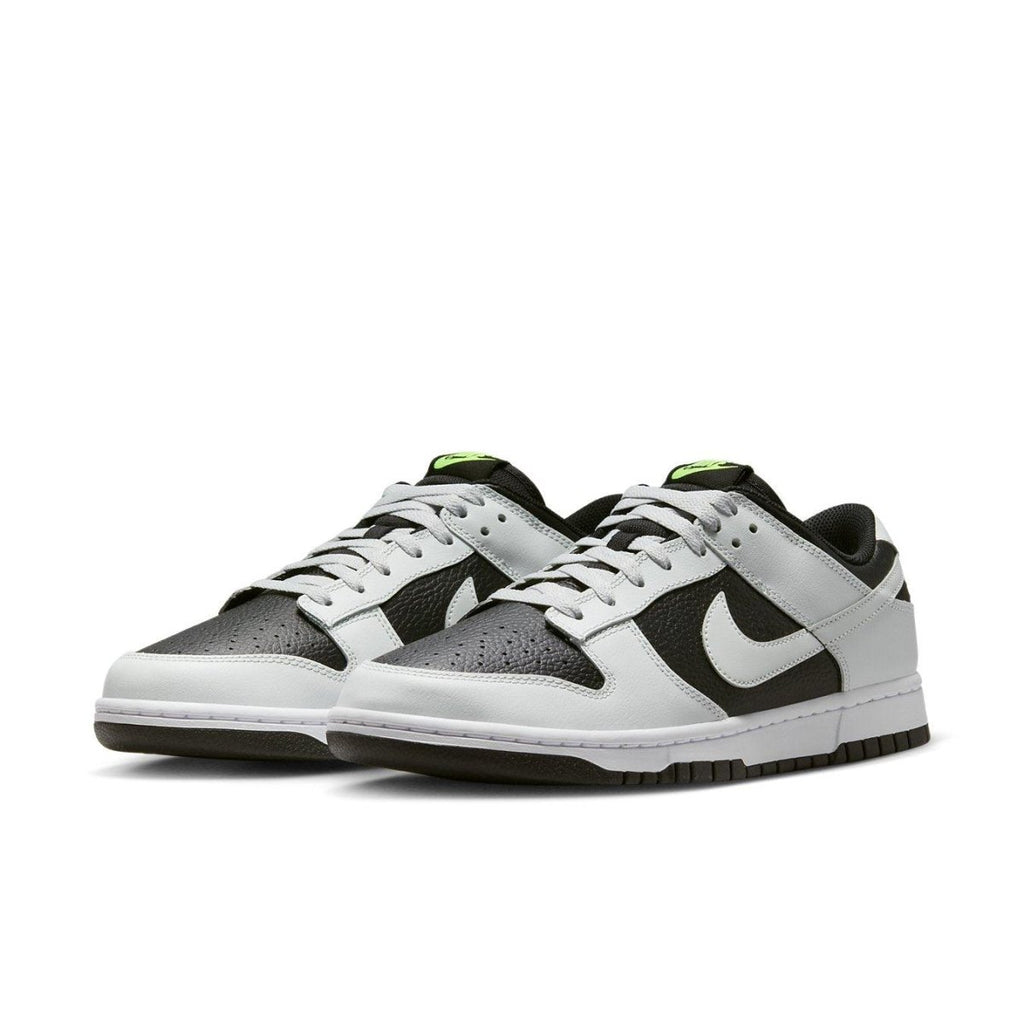 Nike Dunk Low Grey Panda Volt featuring black and white leather, with neon accents and classic white rubber sole.