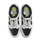 Nike Dunk Low Grey Panda Volt sneakers with black and white design, featuring neon green accents on tongue and insoles.