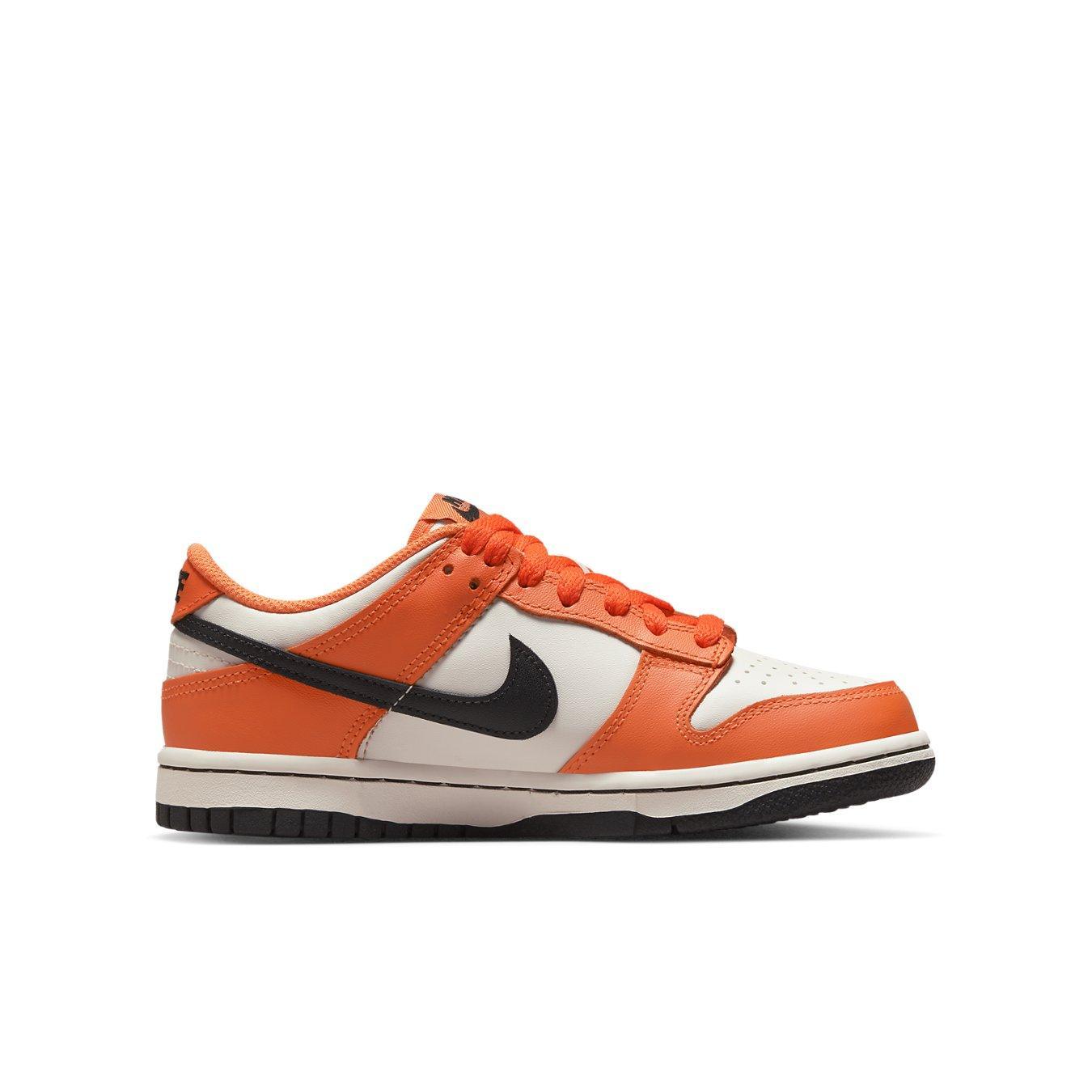Nike Dunk Low Halloween 2022 GS in orange and black, featuring a stylish design perfect for casual wear.