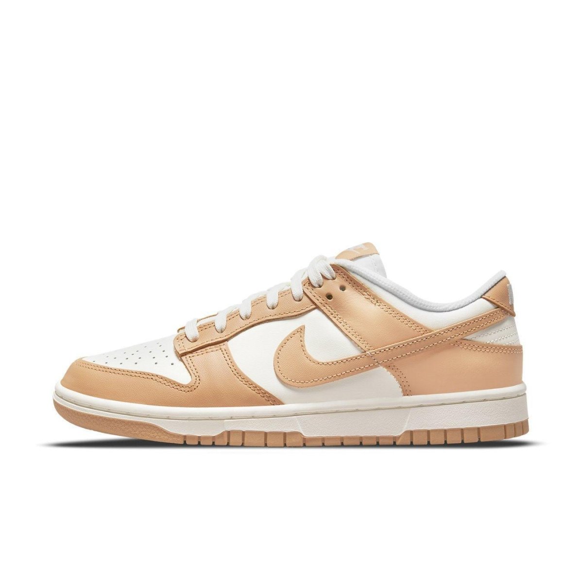 Nike Dunk Low Harvest Moon women's sneaker in white and light brown with perforations and gum sole.