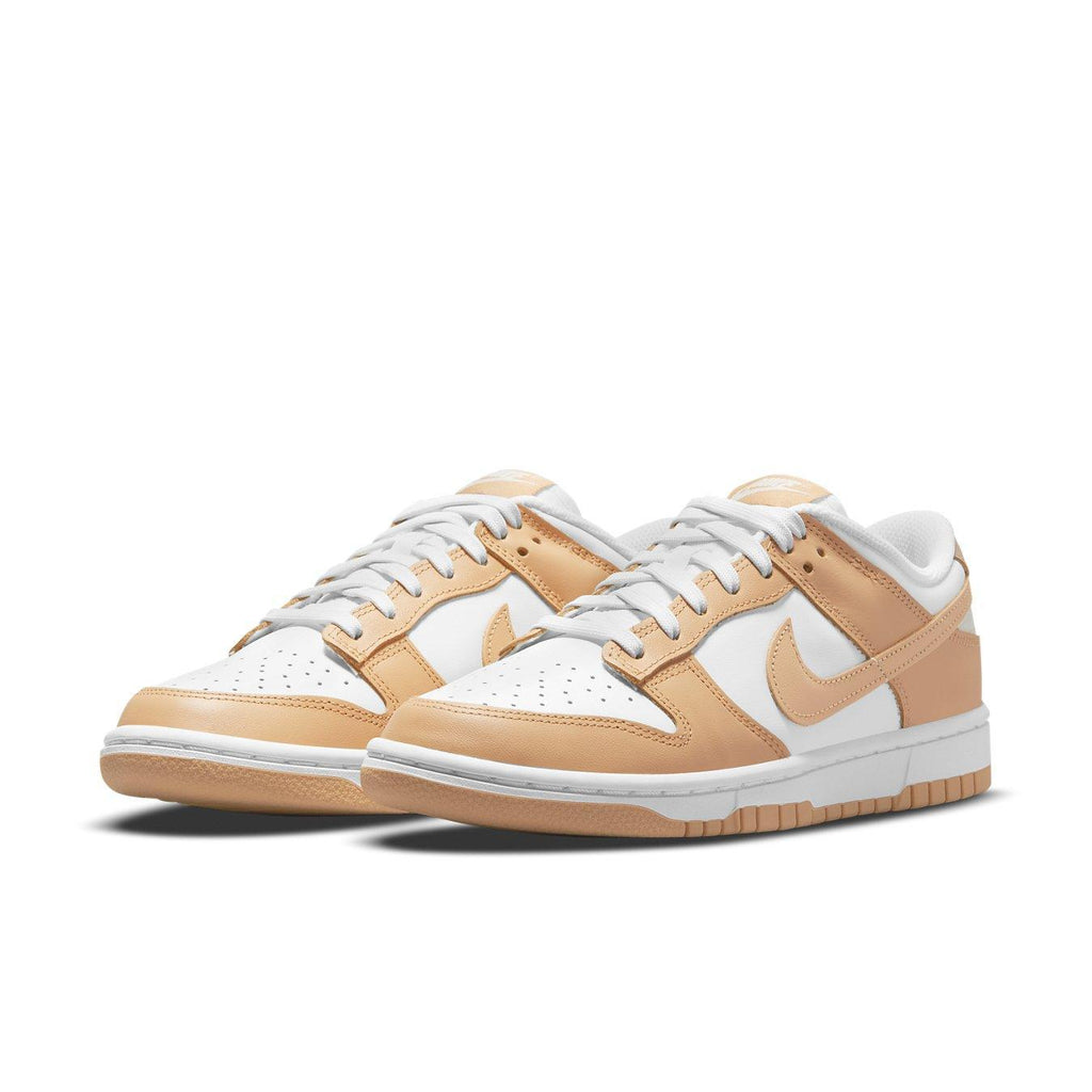 Nike Dunk Low Harvest Moon (W) sneakers in white and light brown with perforated toe and rubber gum sole.