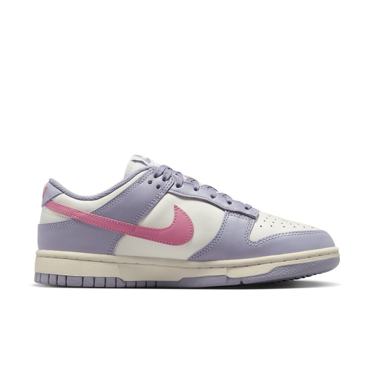 Nike Dunk Low Indigo Haze women's sneakers in pastel indigo and cream with pink Swoosh.