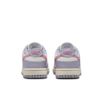 Nike Dunk Low Indigo Haze women's sneakers, featuring purple and pink rear design.