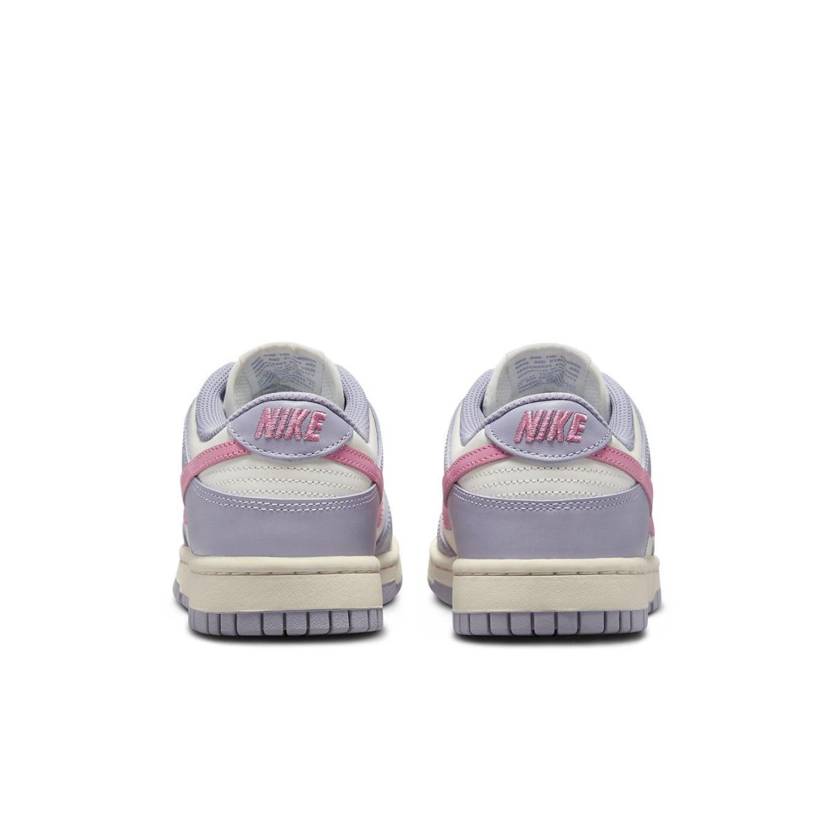 Nike Dunk Low Indigo Haze women's sneakers, featuring purple and pink rear design.