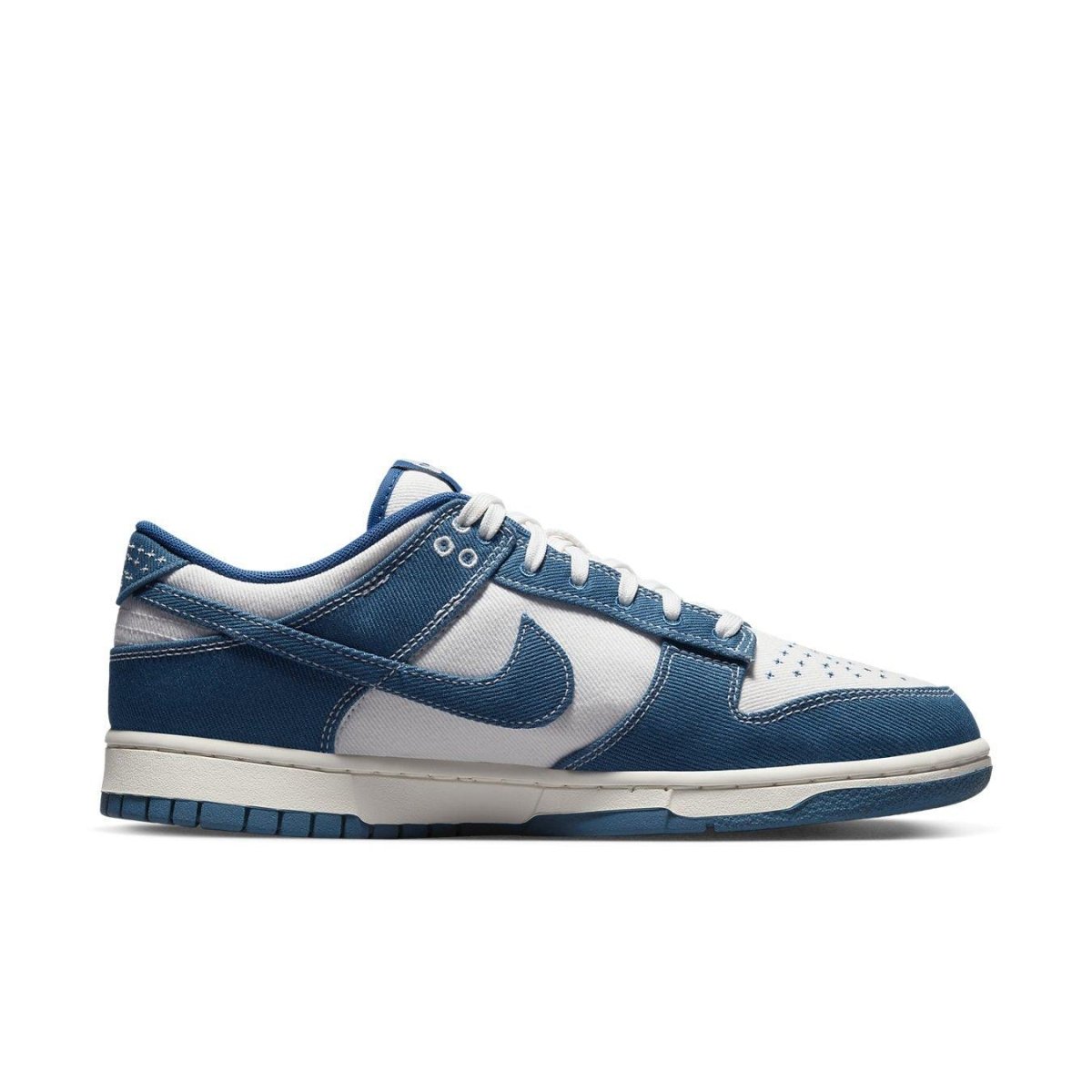 Nike Dunk Low Industrial Blue Sashiko sneaker featuring blue denim and white cushioned layers with contrasting stitching.