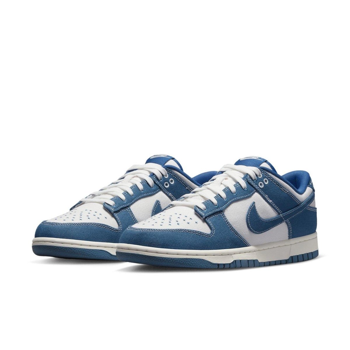 Nike Dunk Low Industrial Blue Sashiko sneakers featuring white and blue denim with contrast stitching.