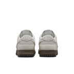Nike Dunk Low Ironstone sneaker rear view with light grey upper and chocolate sole.