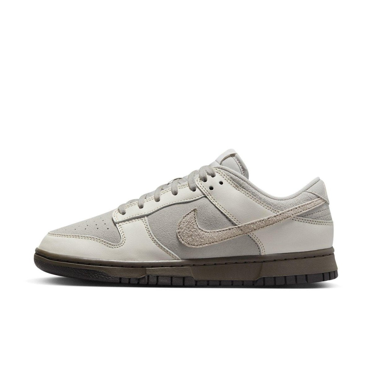 Nike Dunk Low Ironstone in beige and brown, featuring a blend of textures and a sleek design for stylish comfort.