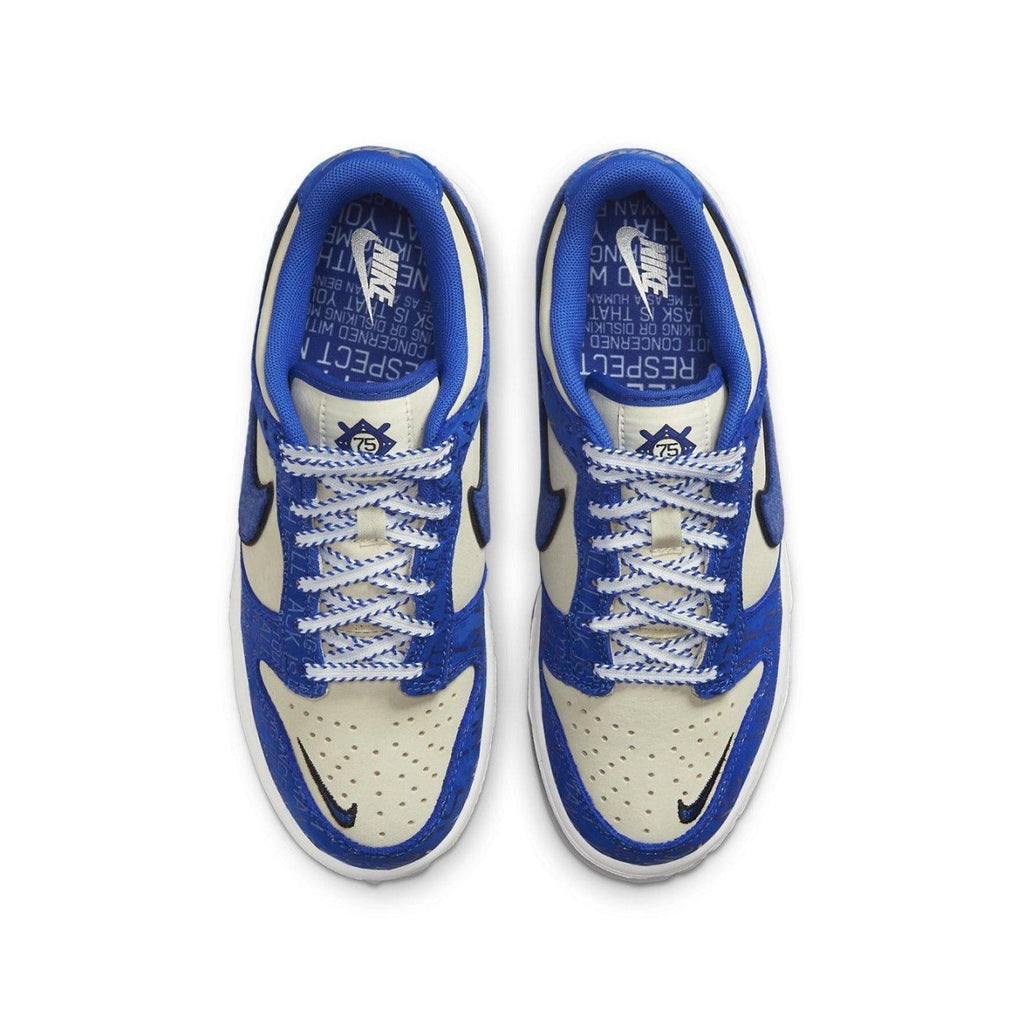 Nike Dunk Low Jackie Robinson (GS) sneakers in blue and cream, featuring #42 on heel and unique design details.