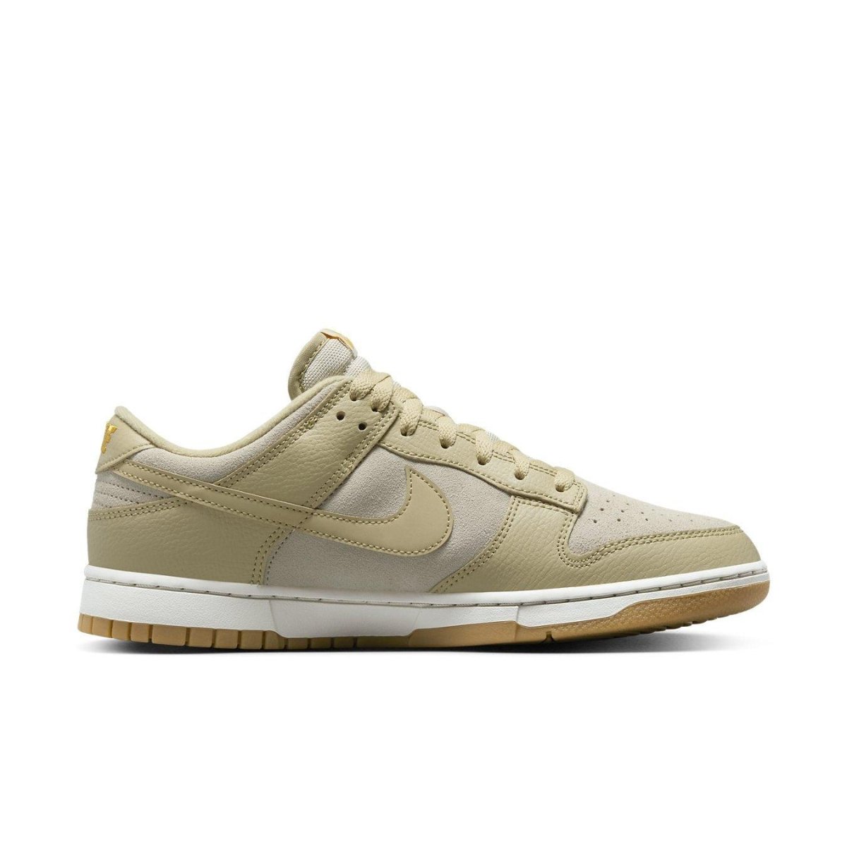 Nike Dunk Low Khaki Suede Gum sneakers featuring premium materials and classic Swoosh design.