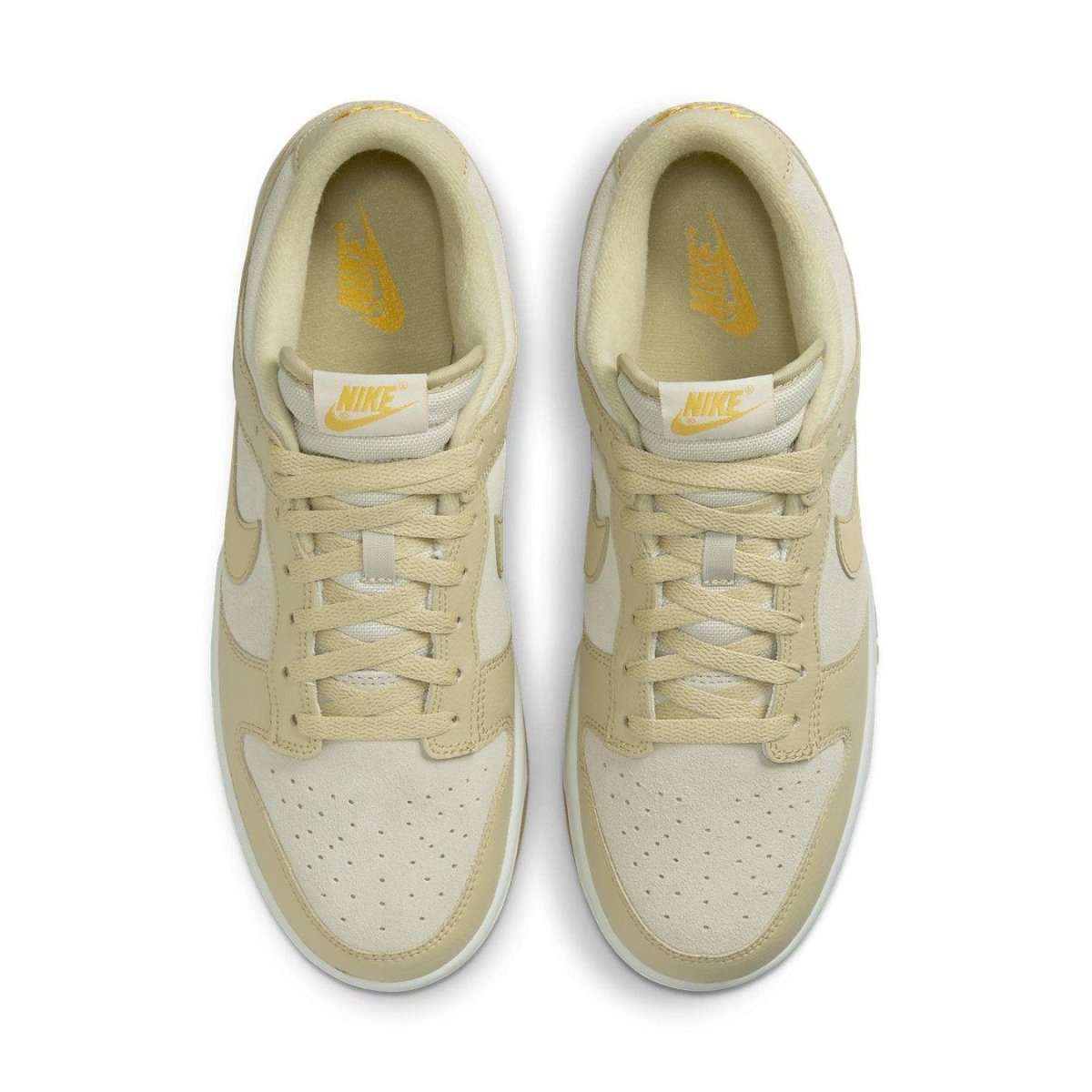 Nike Dunk Low Khaki Suede Gum sneakers with perforated toe and signature Swoosh design, top view.