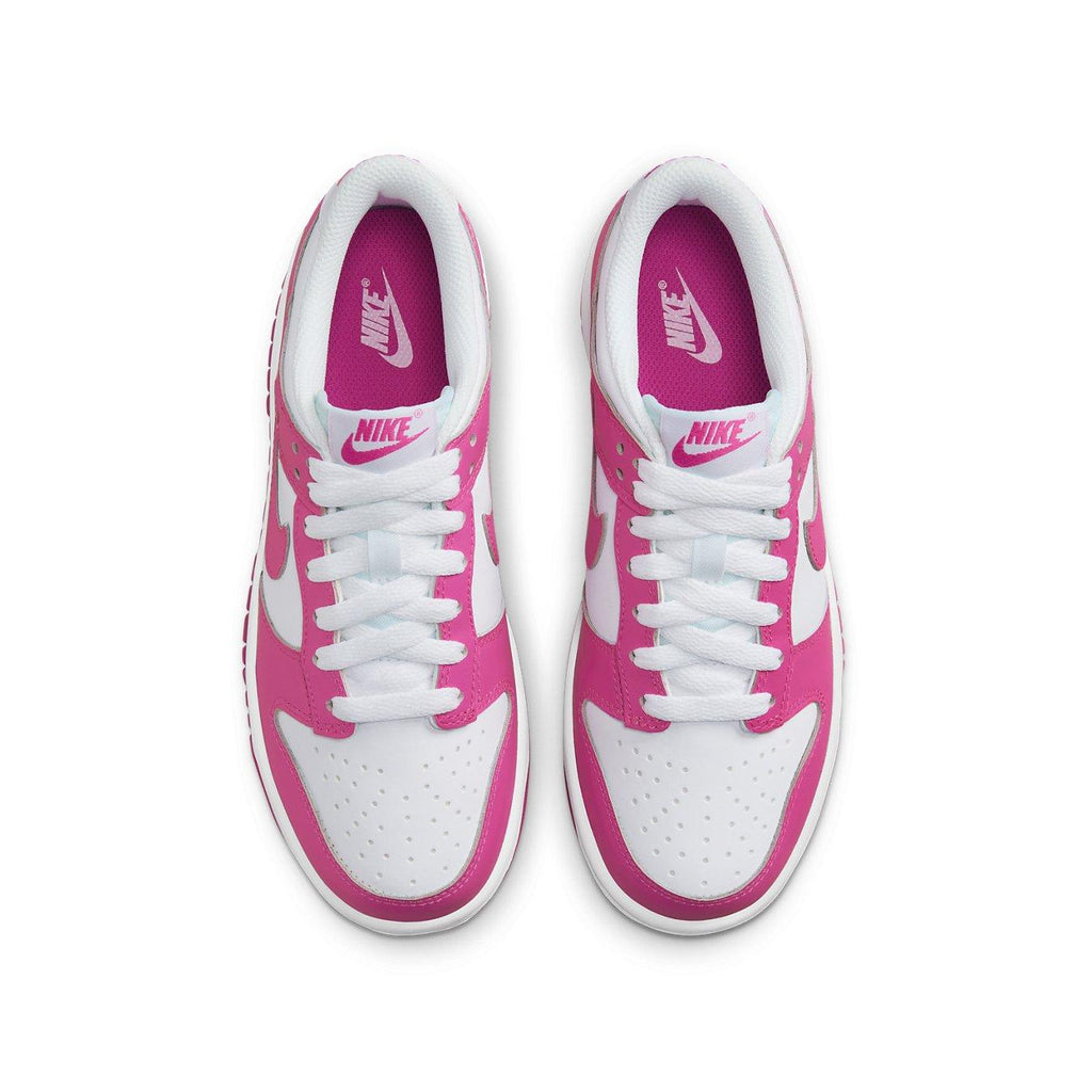 Nike Dunk Low Laser Fuchsia GS sneakers, stylish design in pink and white, perfect for casual or active wear.