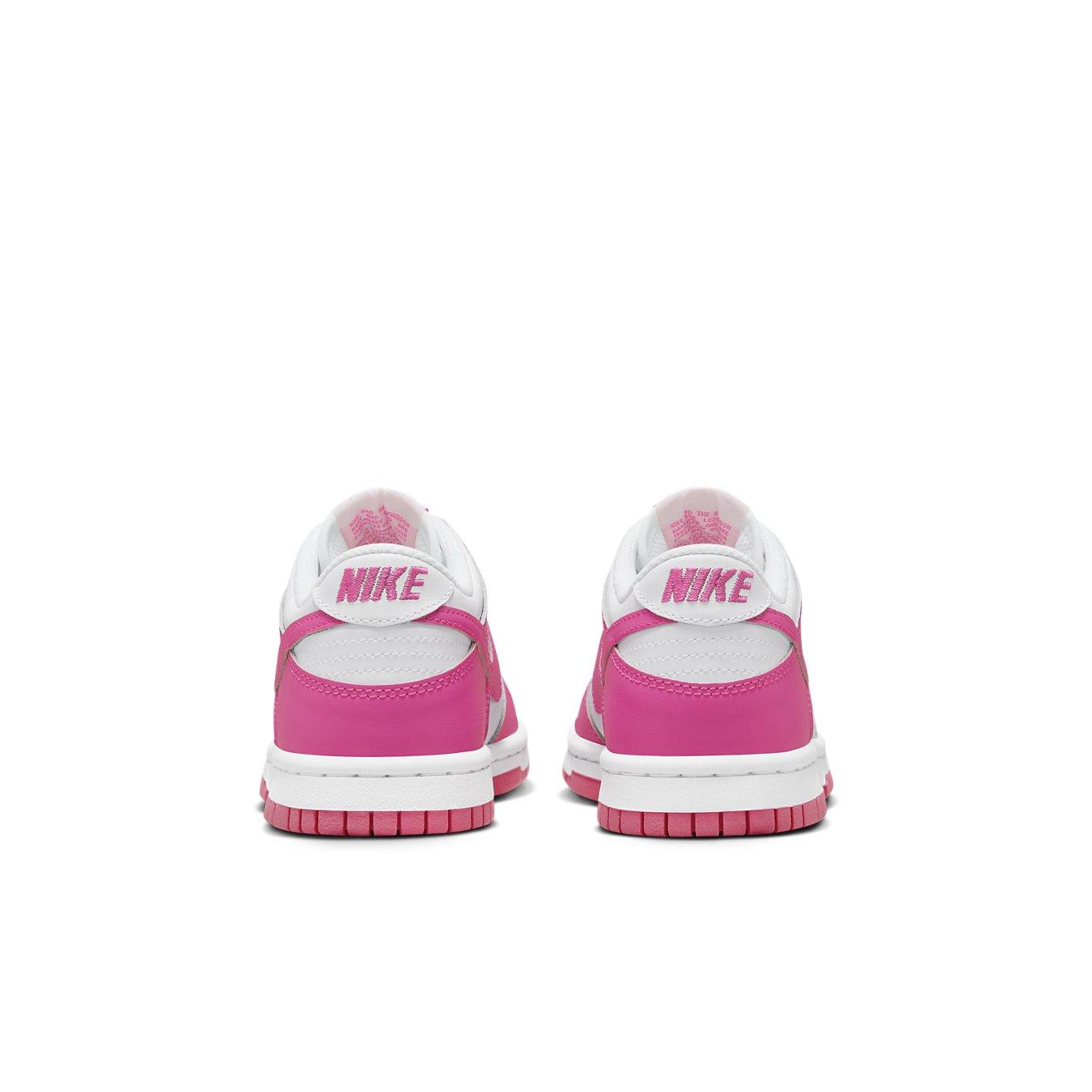 Nike Dunk Low Laser Fuchsia GS sneakers, featuring a stylish design with vibrant pink accents.