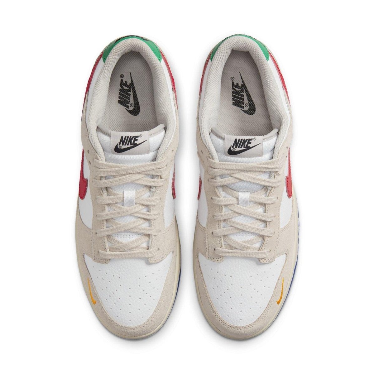 Nike Dunk Low Light Iron Ore featuring red, blue, and green accents on a white and beige upper.