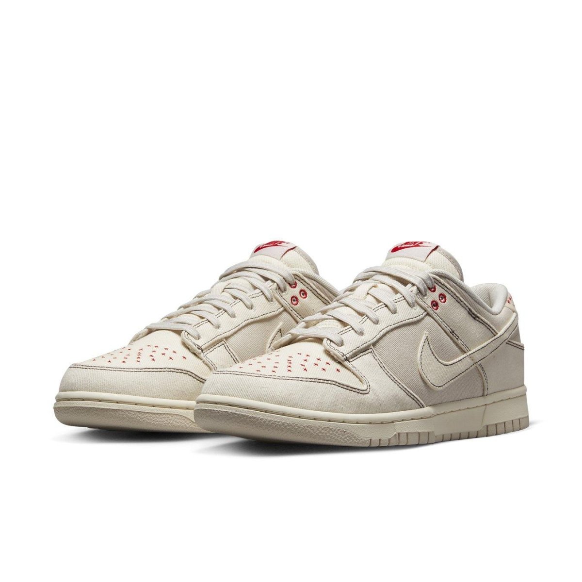 Nike Dunk Low Light Orewood Brown Sashiko sneakers featuring a cream upper and red accents.