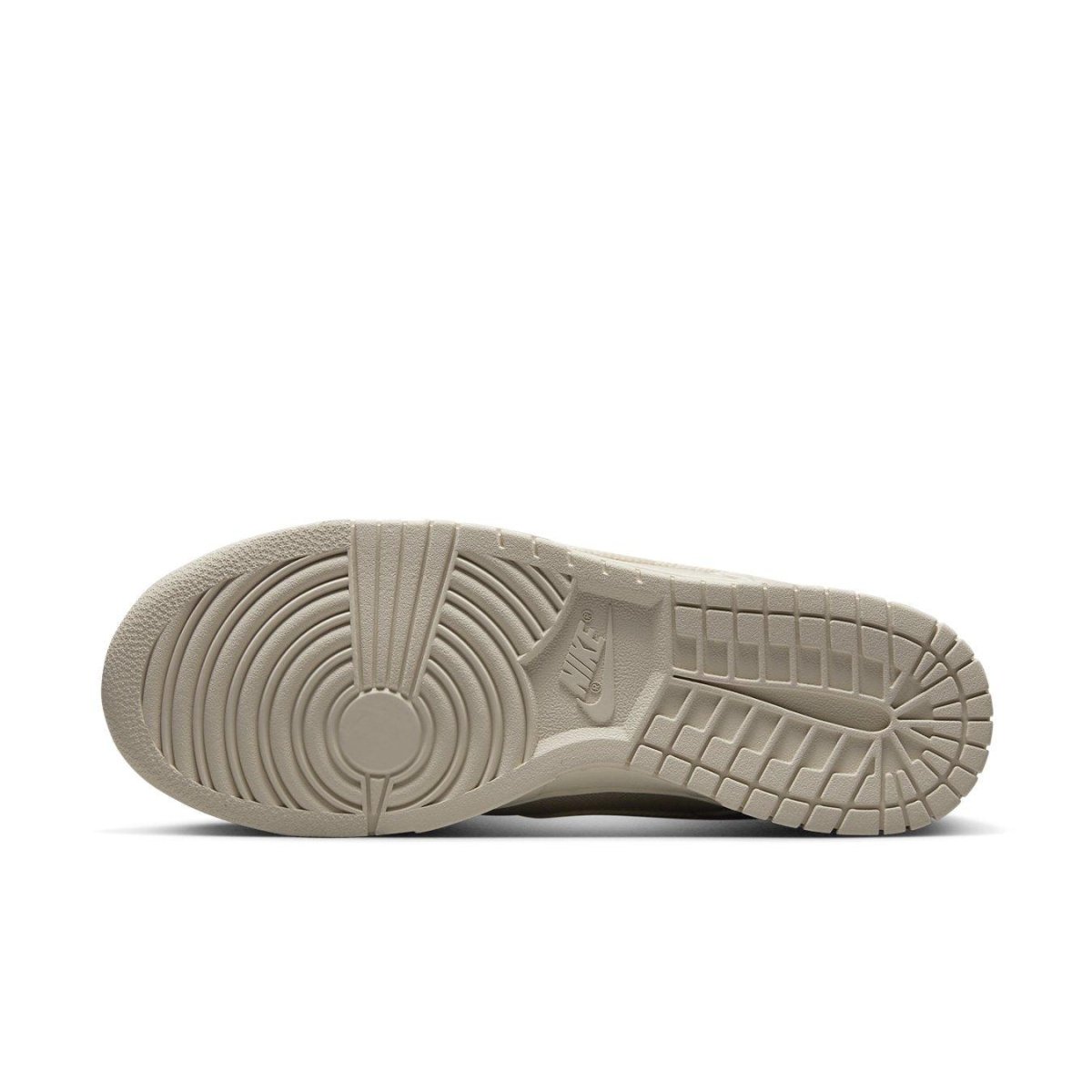 Bottom view of Nike Dunk Low Light Orewood Brown Sashiko showcasing the textured outsole design.