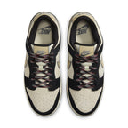 Nike Dunk Low LX Black Team Gold sneakers with sesame print and contrasting Swoosh design.
