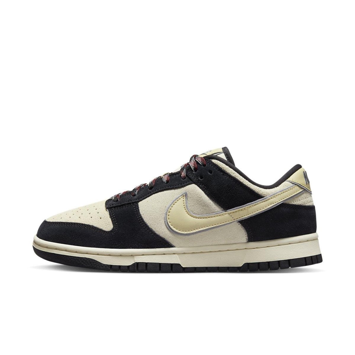 Nike Dunk Low LX Black Team Gold women's sneakers with sesame seed design and black accents.